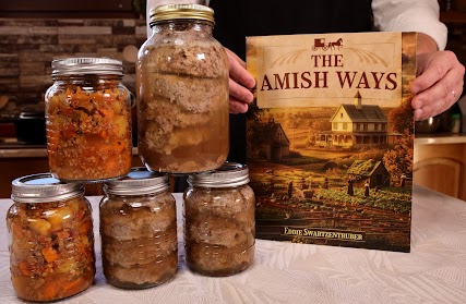 The Amish Ways book with jars of preserved food on a homestead kitchen table
