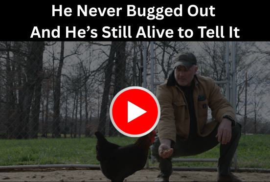 Man feeding chicken on homestead showing bug-in survival strategy