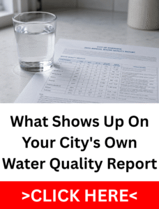 Glass of clear tap water resting on a printed annual city water quality report showing contaminant levels